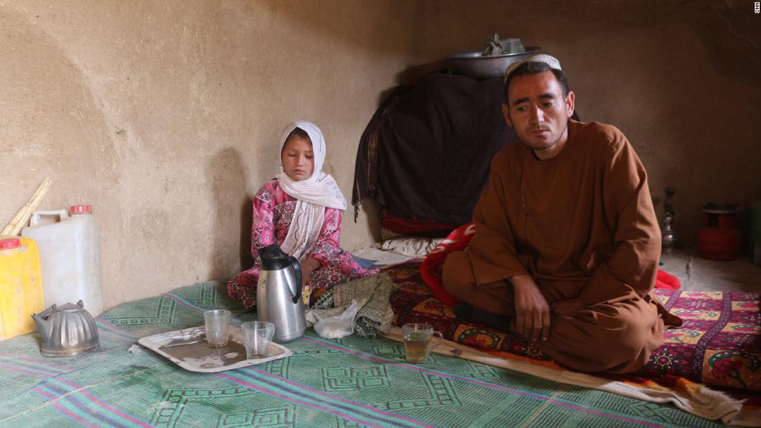Parwana Malik 9 and her father Abdul in their home at a camp for internally displaced people in Afghanistans Badghis provincejpg