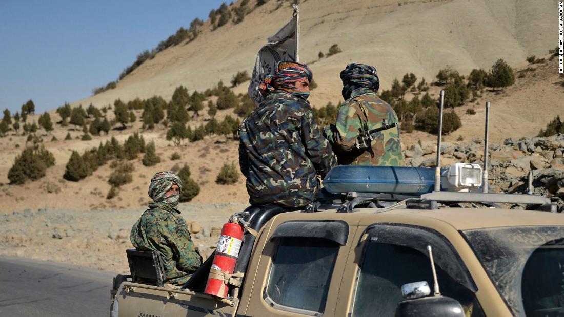 Taliban fighters on a pick up truck along a road in Band Sabzak area in Badghis province Afghanistan on October 17